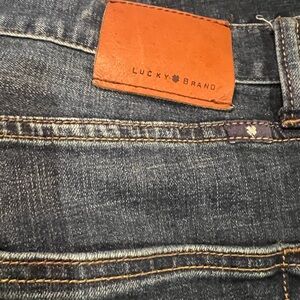Lucky Brand Men's Dark Denim Jeans with Brown Patch